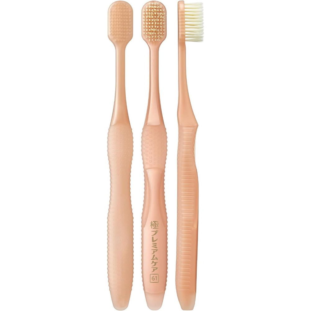 Side and front view of EBiSU KIWAMI Premium Care #61 Japanese toothbrush showing soft wide head bristles and ergonomic handle design