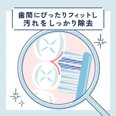 Ora2 me Spiral Catch Japanese toothbrush fitting between teeth for effective interdental cleaning